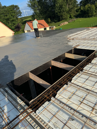 coulage et tirage de la dalle étage