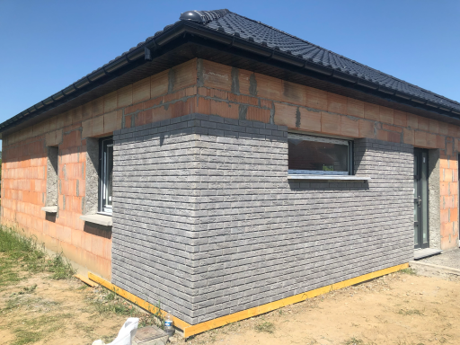 pose de briquette sur façade